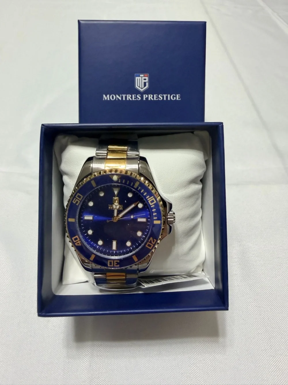 Montres Prestige by Invicta. Gold and Silver 2 tone with blue dial men’s watch